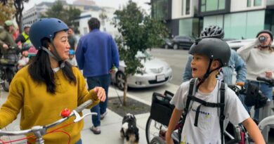 Students and parents swap the bus for biking to school together