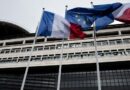 Fitch agency maintains France's 'AA-' credit rating but downgrades outlook