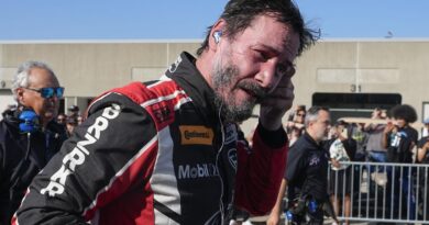 Keanu Reeves debuts as pro auto racer at Indianapolis Motor Speedway, spins out