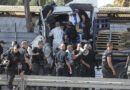 Truck slammed into bus stop near Tel Aviv killing 1, injuring dozens