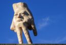 Giant hand’s removal from top of New Zealand building is proving controversial