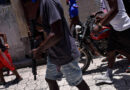 Haiti’s gangs luring more children into crime and sexual abuse, HRW says, as 115 people killed in attack