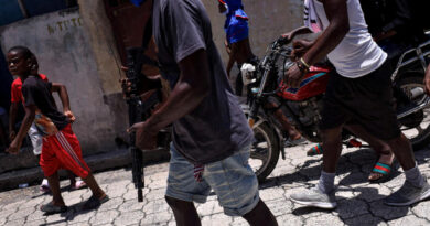 Haiti’s gangs luring more children into crime and sexual abuse, HRW says, as 115 people killed in attack