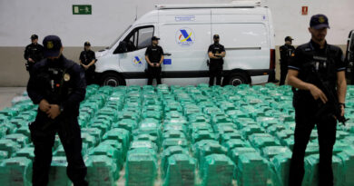 Police seize record cocaine haul in banana shipment in Spain; woman arrested and 2 suspects at large