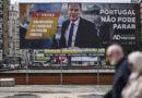 Portuguese PM's party claims election win, falls short of majority