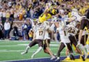 Michigan claims controversial victory over Western Michigan on Hail Mary